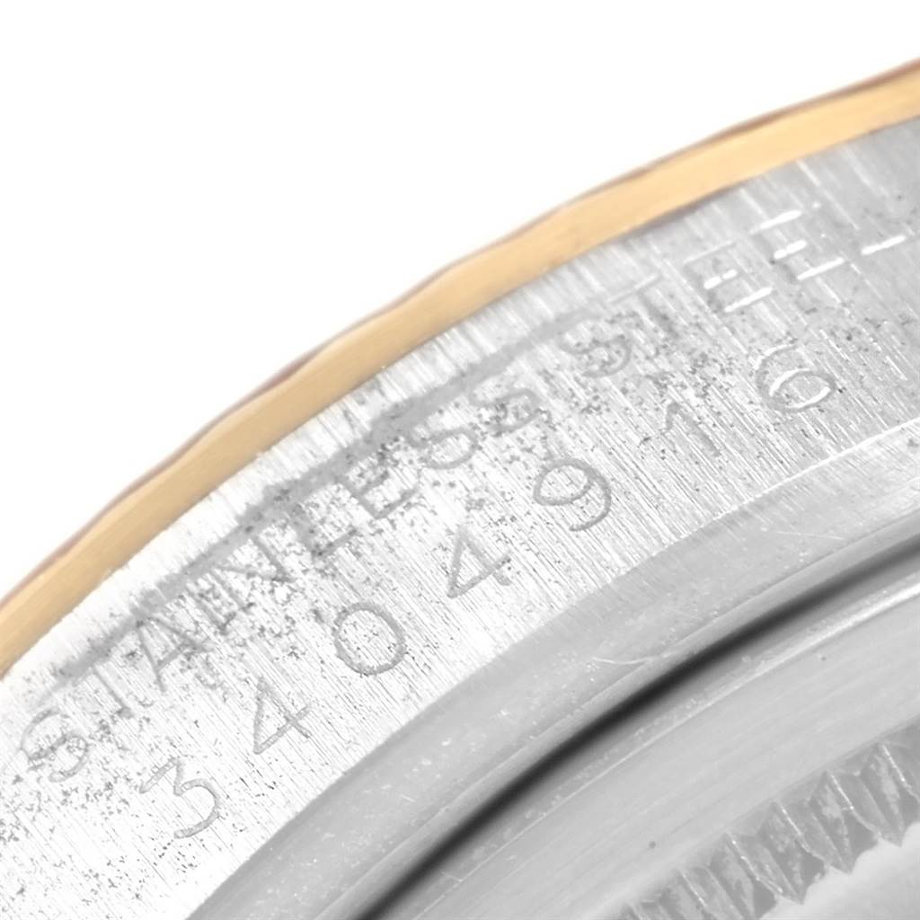 This close-up image shows the edge of the case back with engraved serial numbers of the Vintage Collection model by Rolex.