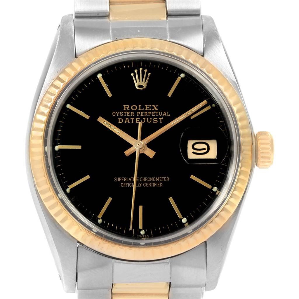 This image shows a frontal view of the Rolex Vintage Collection 1601 Men's Steel and Gold (two tone) Black Dial 1601 Men's Steel and Gold (two tone) Black Dial Datejust watch, highlighting its black dial, gold accents, and date function.
