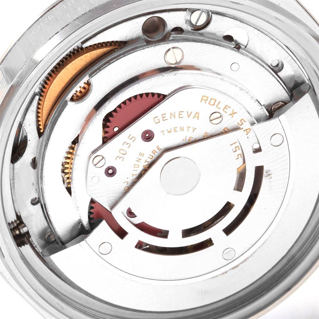 This image shows a close-up view of the movement mechanism of a Vintage Collection Rolex watch.