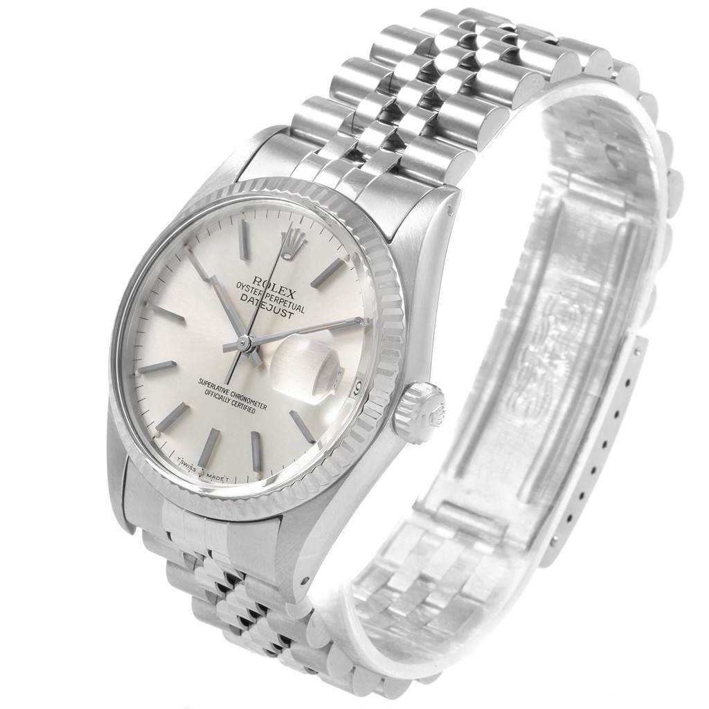 The image shows a side view of the Rolex Vintage Collection 16014 Men's Stainless Steel Silver Dial 16014 Men's Stainless Steel Silver Dial model, showcasing its dial, crown, and metal bracelet.