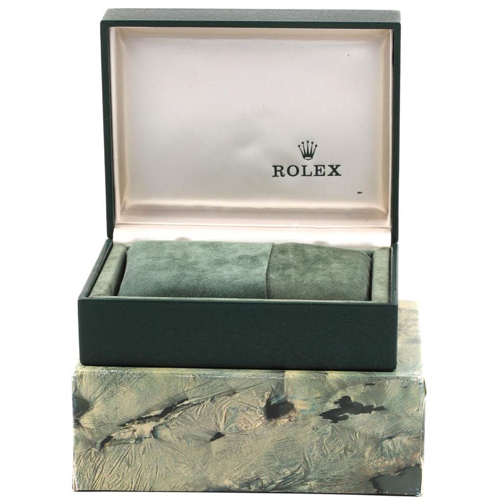 The image shows the open box and packaging for a Vintage Collection model by Rolex.