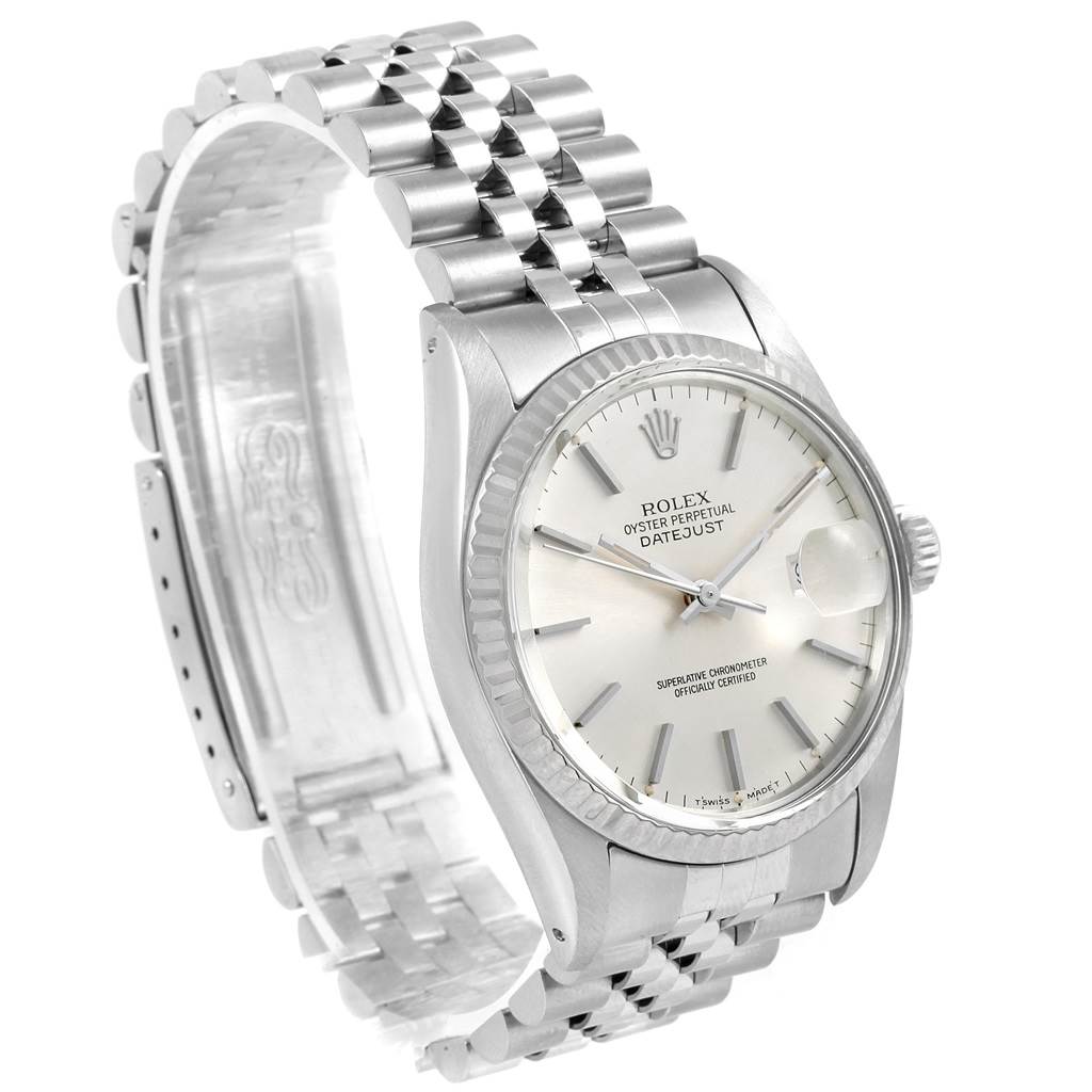 This image shows a side angle view of the Rolex Vintage Collection 16014 Men's Stainless Steel Silver Dial 16014 Men's Stainless Steel Silver Dial Oyster Perpetual Datejust watch, highlighting the face, bezel, and bracelet.