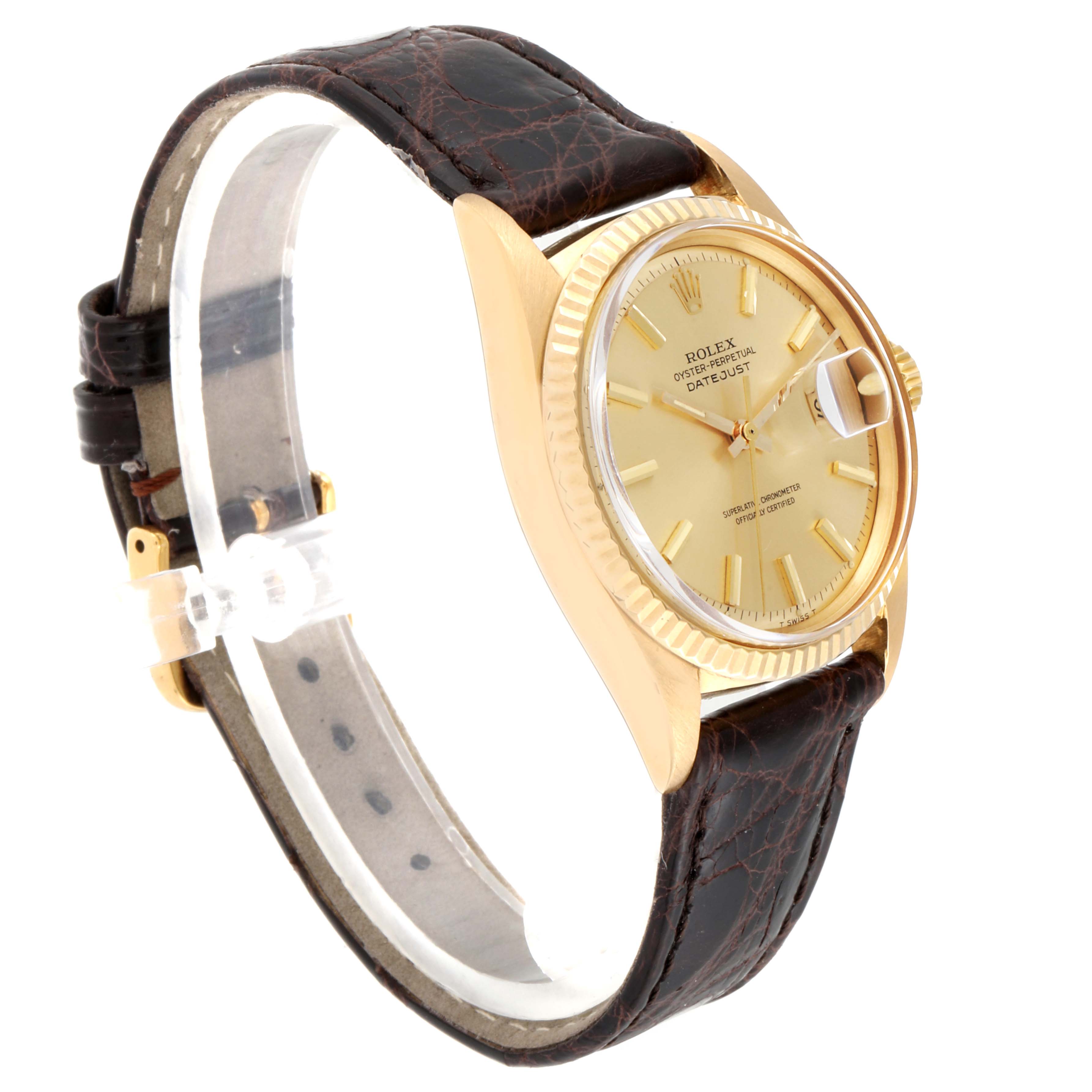 The image shows a side angle view of the Rolex Vintage Collection 1601 Men
s Yellow Gold Champagne Dial 1601 Men
s Yellow Gold Champagne Dial model, featuring its gold case and brown leather strap.