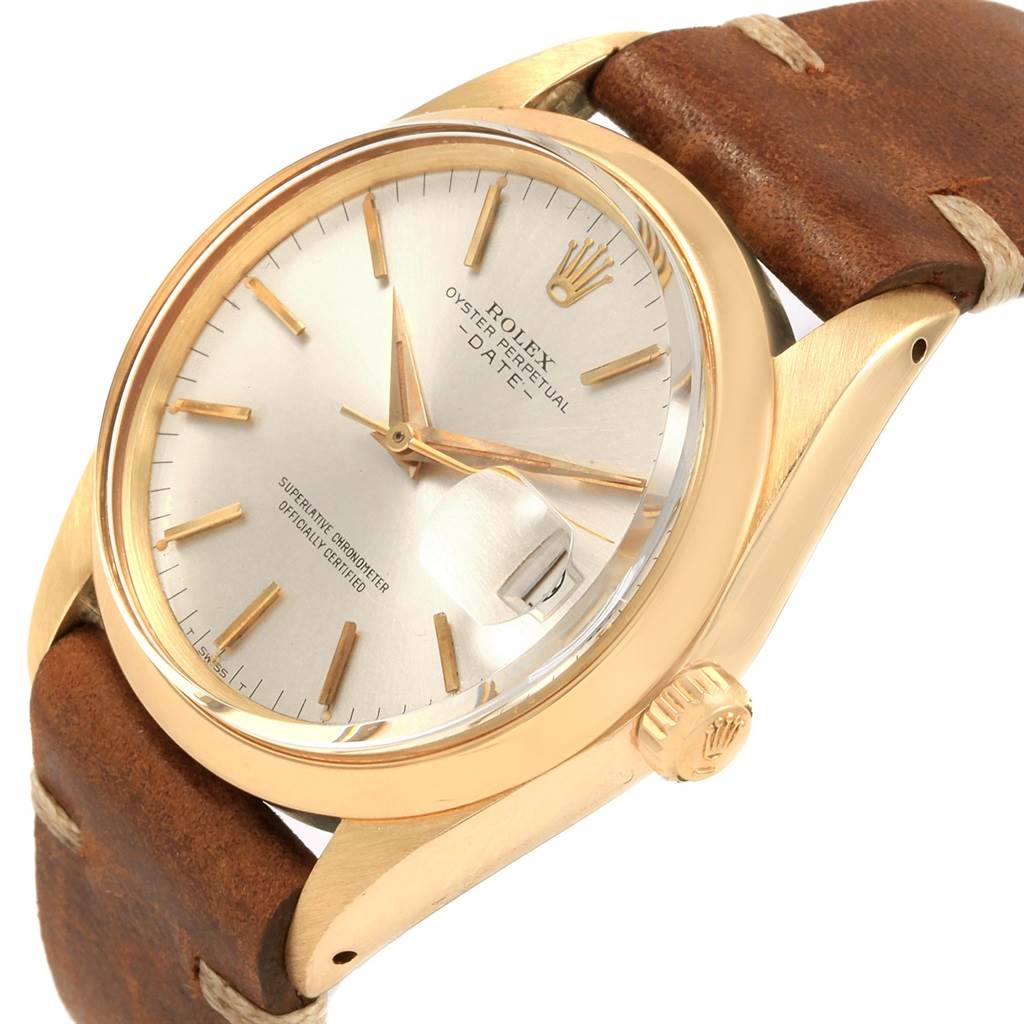 The Rolex Vintage Collection 1500 Men
s Yellow Gold Silver Dial 1500 Men
s Yellow Gold Silver Dial model is shown at a front-angle view, showcasing its dial, bezel, crown, and leather strap.