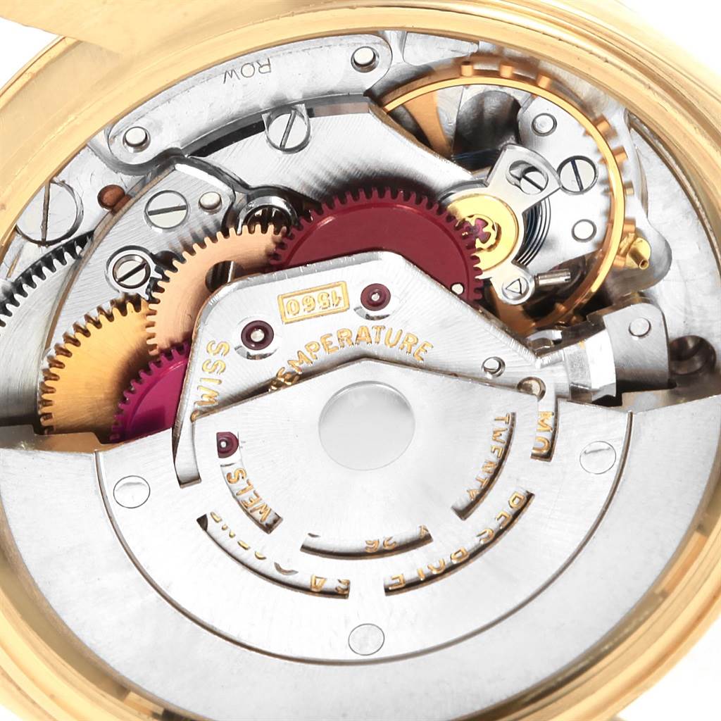 The image shows the intricate mechanical movement of a Vintage Collection model Rolex watch from an internal angle.