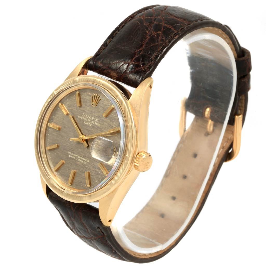 This image shows a Rolex Vintage Collection 1501 Men's Yellow Gold Brown Dial 1501 Men's Yellow Gold Brown Dial watch from a front angle, displaying its face, crown, strap, and buckle.