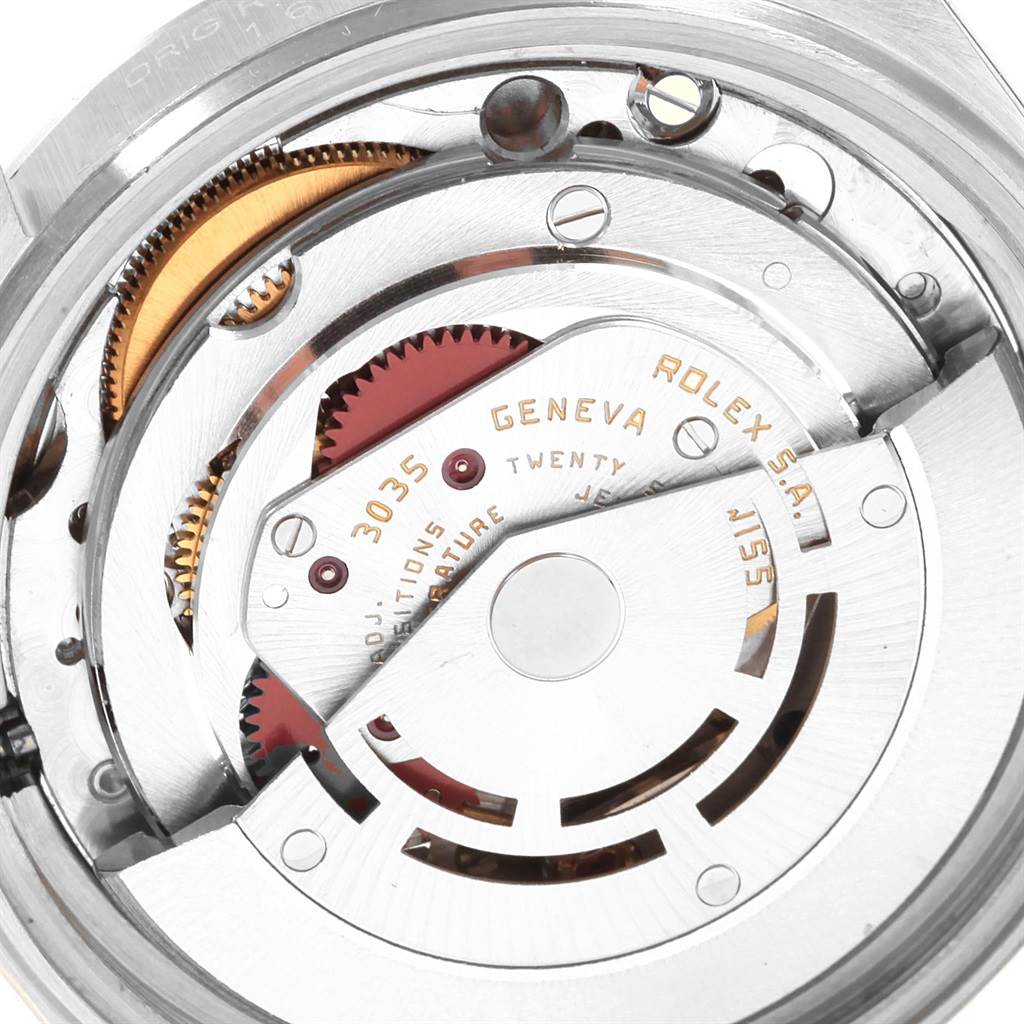 The image shows a close-up view of the movement mechanism of the Rolex Vintage Collection 16014 Men's Stainless Steel Silver Dial 16014 Men's Stainless Steel Silver Dial model, highlighting gears and components.