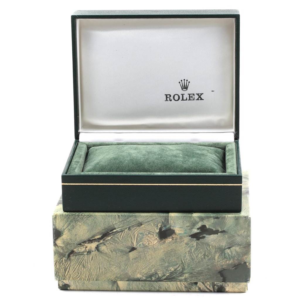 The image shows an open Rolex Vintage Collection 1601 Men's Stainless Steel Silver Dial 1601 Men's Stainless Steel Silver Dial watch box from a front angle, displaying the interior cushion and logo.