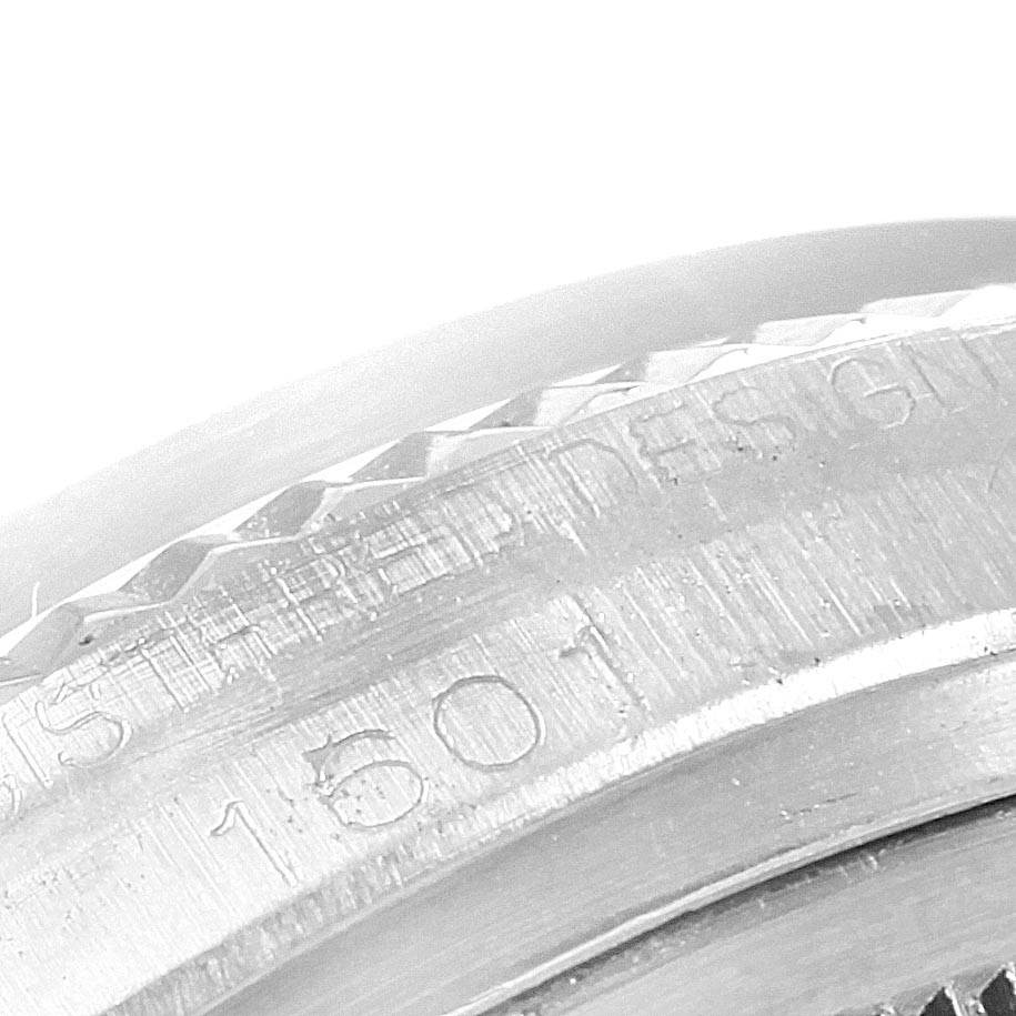 The image shows a close-up of the edge and model engraving ("1501") on a Rolex Vintage Collection 1601 Men's Stainless Steel Silver Dial 1601 Men's Stainless Steel Silver Dial watch case.