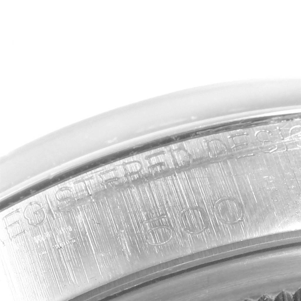 The image shows a close-up of the edge of the case back of the Rolex Vintage Collection 1500 Stainless Steel Silver Dial 1500 Stainless Steel Silver Dial watch.