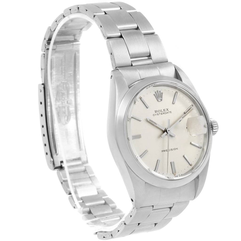 The image shows a side angle of a Rolex Vintage Collection 6694 Men's Stainless Steel Silver Dial 6694 Men's Stainless Steel Silver Dial watch, highlighting its stainless steel bracelet and minimalist dial.