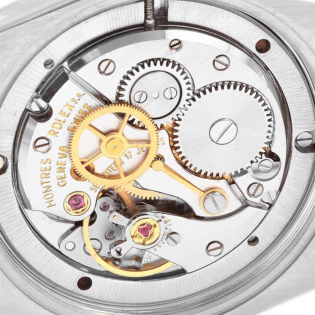 The image is a close-up of the movement mechanism of a Rolex Vintage Collection 6694 Men's Stainless Steel Silver Dial 6694 Men's Stainless Steel Silver Dial watch.