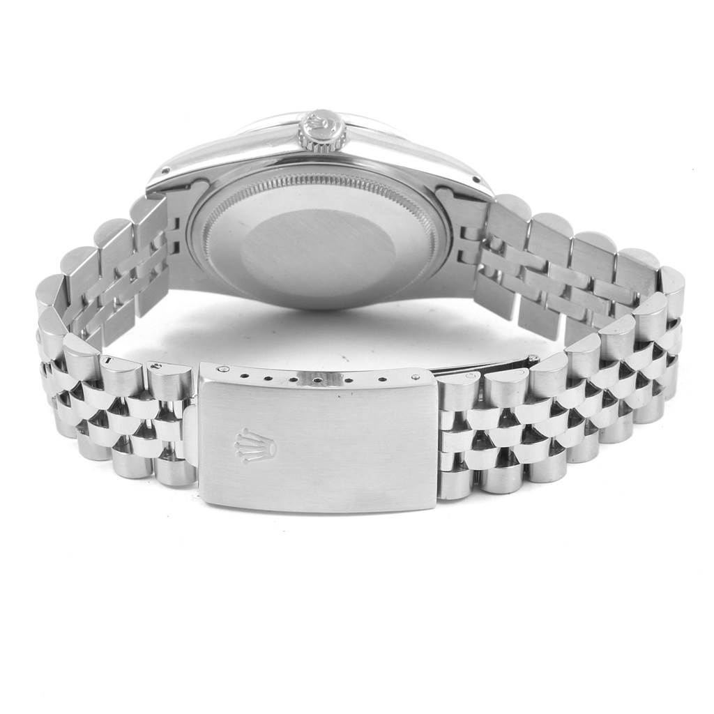 The image shows the back case and clasp of a Rolex Vintage Collection 16014 Men's Stainless Steel Black Dial 16014 Men's Stainless Steel Black Dial watch, featuring a stainless steel bracelet.