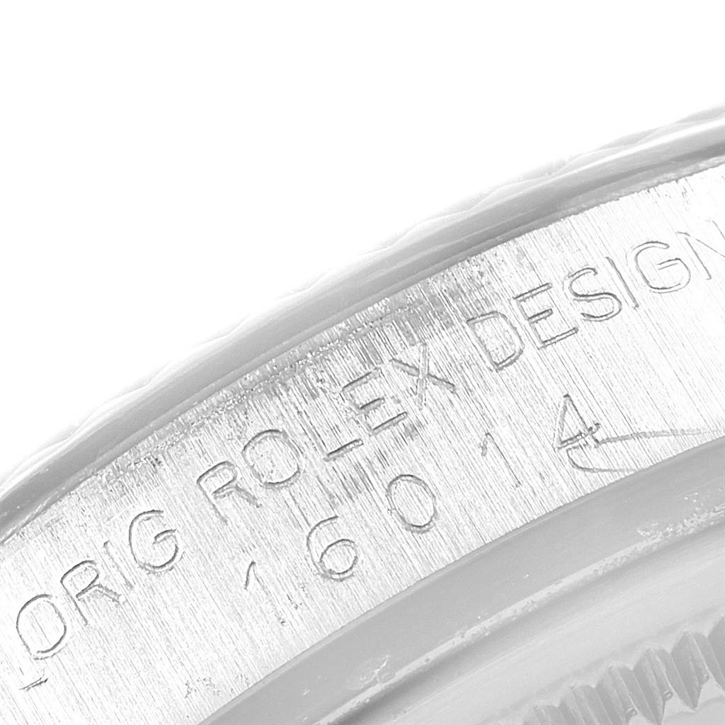 This image shows a close-up of the engraved bezel of the Rolex Vintage Collection 16014 Men's Stainless Steel Black Dial 16014 Men's Stainless Steel Black Dial model, displaying the model number "16014."
