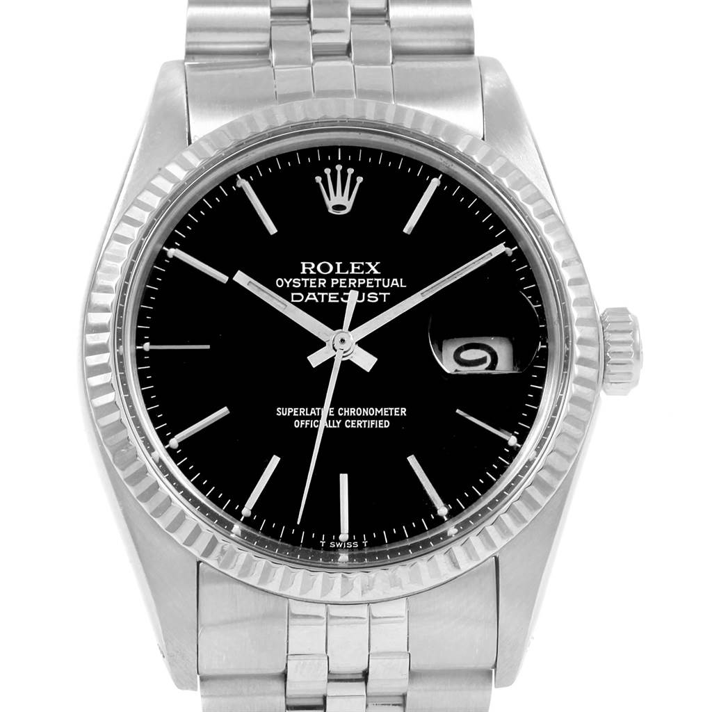 The image shows a front view of the Rolex Vintage Collection 16014 Men's Stainless Steel Black Dial 16014 Men's Stainless Steel Black Dial Datejust watch, highlighting its black dial and stainless steel bracelet.
