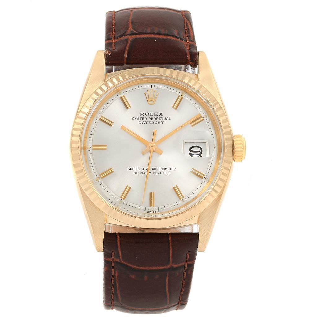 The Rolex Vintage Collection 1601 Men
s Yellow Gold Silver Dial 1601 Men
s Yellow Gold Silver Dial Oyster Perpetual Datejust watch is shown from a front view, displaying the face, dial, case, crown, and leather strap.