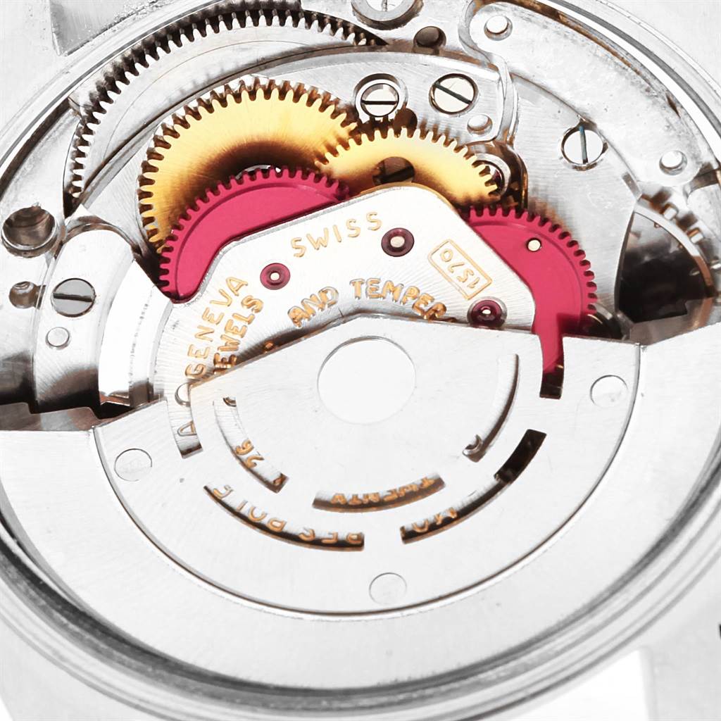 This is a close-up shot of the internal mechanism of a Vintage Collection model by Rolex, showcasing the gears and components. 