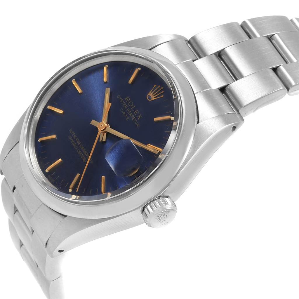 The image shows a diagonal front view of a Rolex Vintage Collection 1500 Men's Stainless Steel Silver Dial 1500 Men's Stainless Steel Silver Dial watch, featuring its blue dial, silver case, and bracelet.
