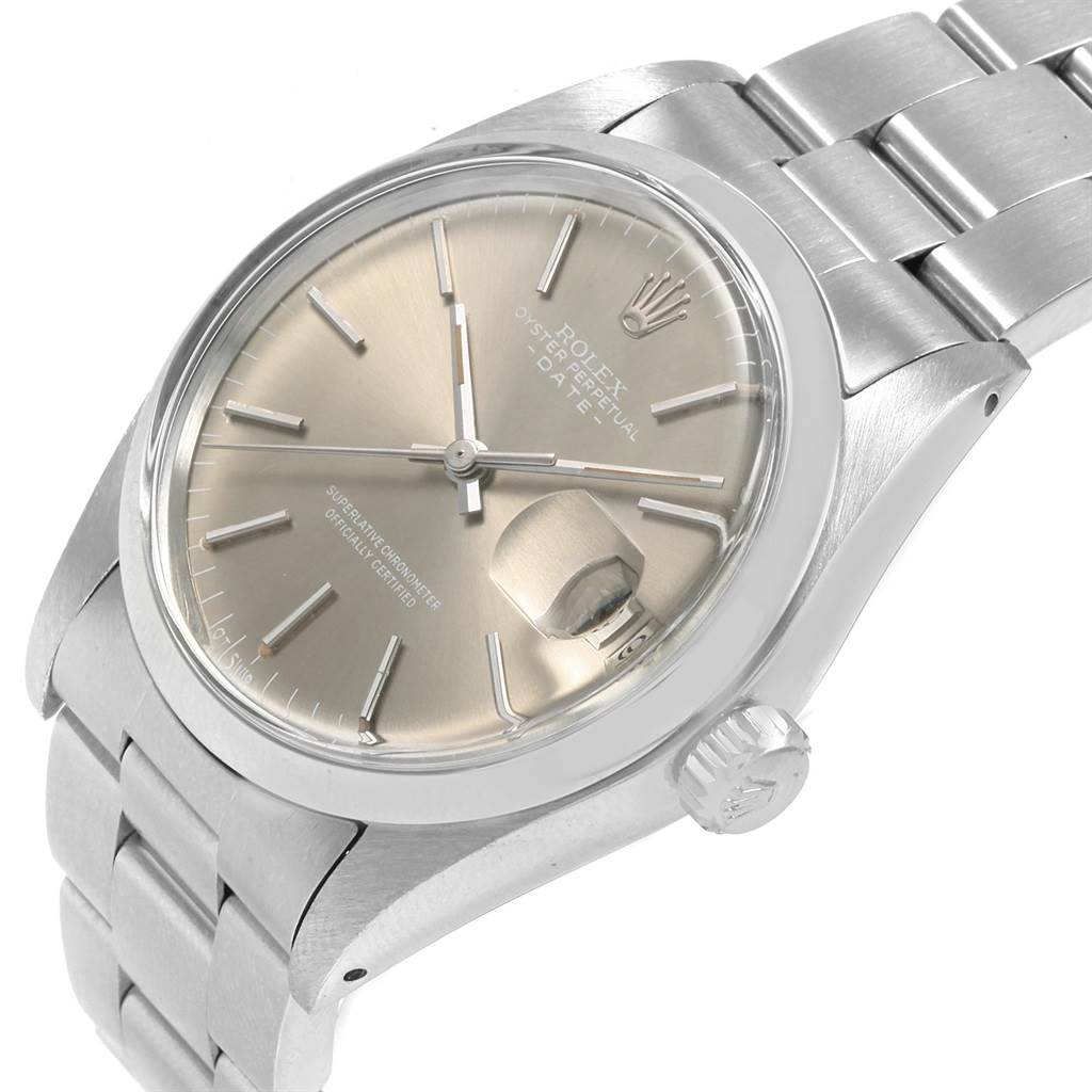 The image shows a close-up angle of the Rolex Vintage Collection 1500 Men's Stainless Steel Silver Dial 1500 Men's Stainless Steel Silver Dial model, displaying the dial, crown, and part of the metal bracelet.