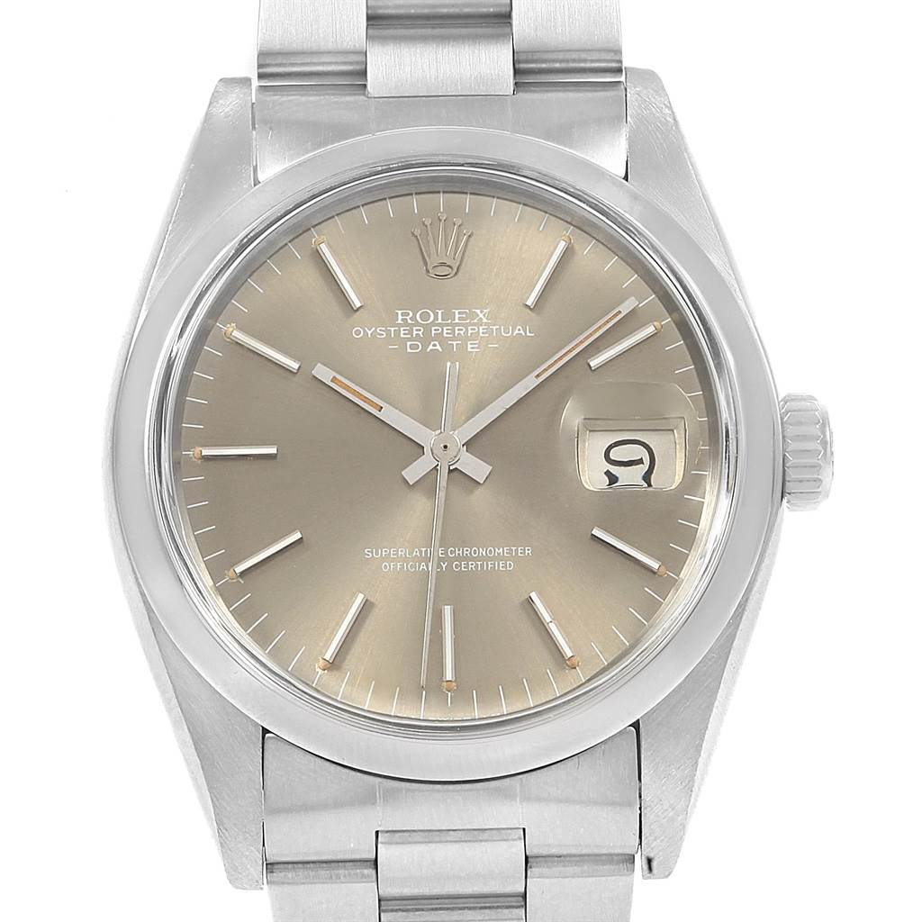 This image shows a front view of the Rolex Vintage Collection 1500 Men's Stainless Steel Silver Dial 1500 Men's Stainless Steel Silver Dial model's face, crown, and part of the bracelet.