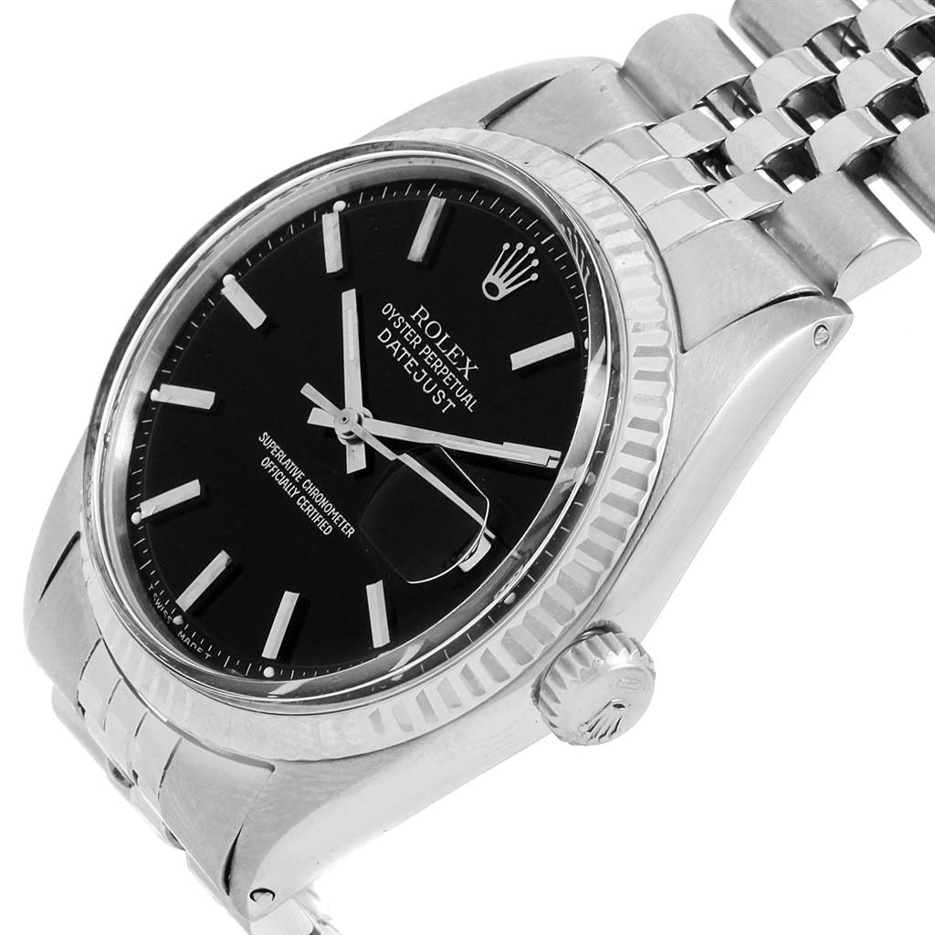 The image shows a close-up angled view of the Rolex Vintage Collection 1601 Men's Stainless Steel Black Dial 1601 Men's Stainless Steel Black Dial Datejust watch, displaying the dial, bezel, crown, and bracelet.
