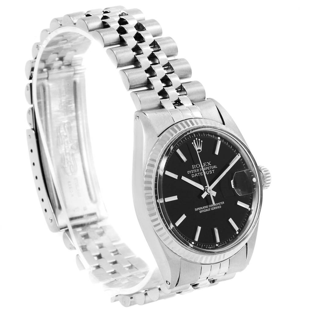 The Rolex Vintage Collection 1601 Men's Stainless Steel Black Dial 1601 Men's Stainless Steel Black Dial model is shown at a slight angle, highlighting the watch face, bezel, and partially opened bracelet.