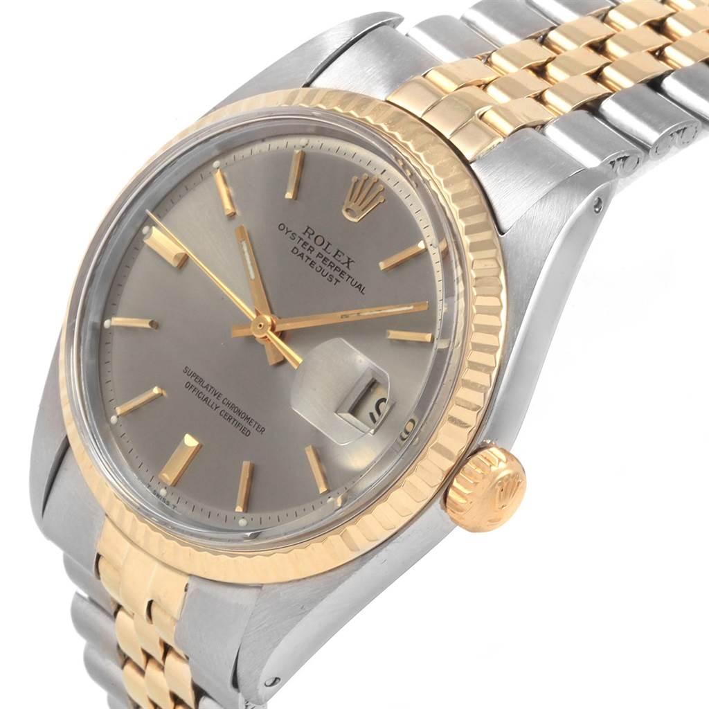 The image shows a close-up angle of the Rolex Vintage Collection 1601 Men's Steel and Gold (two tone) Grey Dial 1601 Men's Steel and Gold (two tone) Grey Dial, highlighting the dial, crown, and part of the two-tone bracelet.