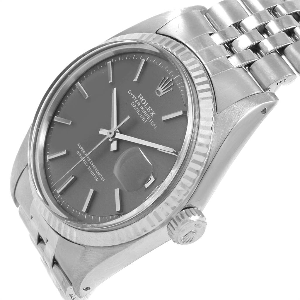 The image shows a side and frontal view of a Rolex Vintage Collection 1601 Men's Stainless Steel Grey Dial 1601 Men's Stainless Steel Grey Dial watch, highlighting the face, bezel, crown, and bracelet.