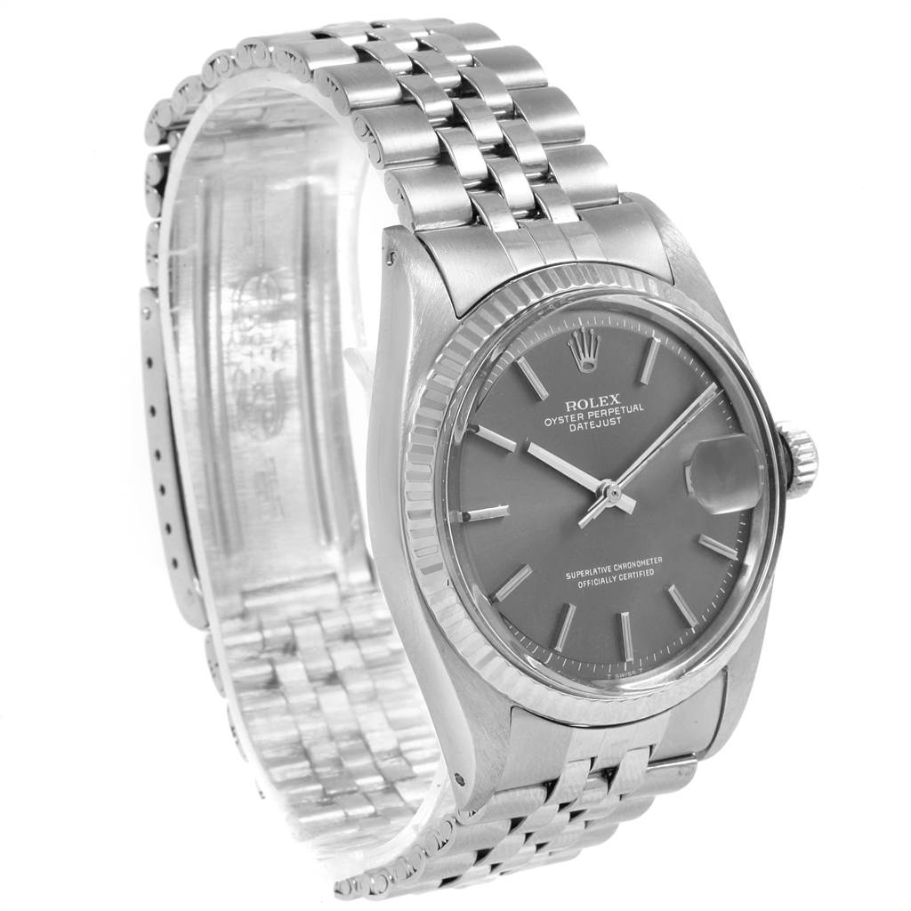 This image shows the Rolex Vintage Collection 1601 Men's Stainless Steel Grey Dial 1601 Men's Stainless Steel Grey Dial model at a slight angle, highlighting its face, case, crown, and bracelet.