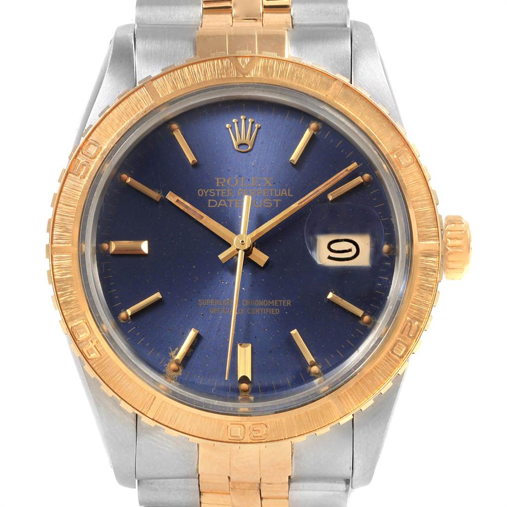 The image shows a Rolex Vintage Collection 16253 Men's Steel and Gold (two tone) Blue Dial 16253 Men's Steel and Gold (two tone) Blue Dial watch, highlighting its blue dial, gold bezel, and part of its bracelet from a front angle.