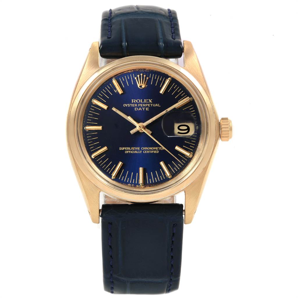 The Rolex Vintage Collection 1503 Men
s Yellow Gold Blue Dial 1503 Men
s Yellow Gold Blue Dial watch is shown from a front-facing angle, displaying its blue dial, gold case, and black leather strap.