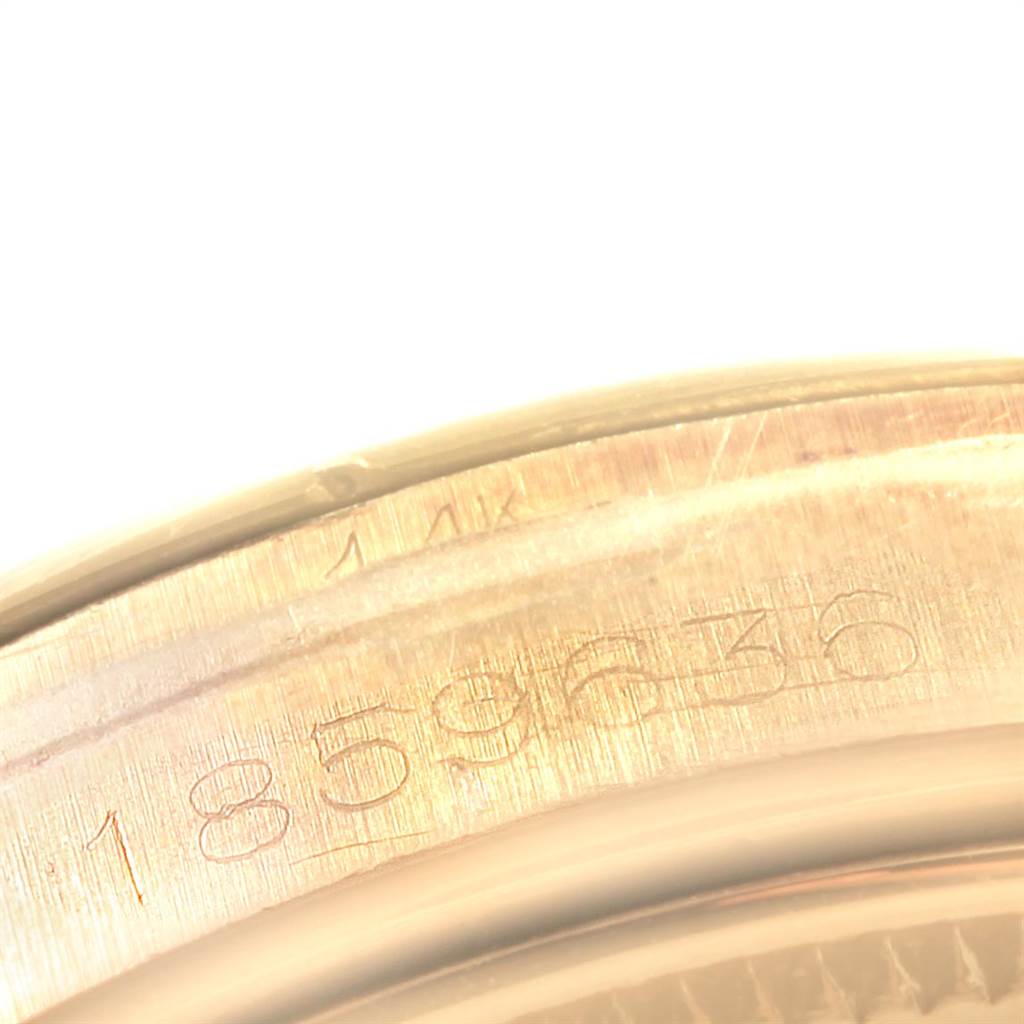 The image shows a close-up of the serial number engraving on the case of a Rolex Vintage Collection 1503 Men's Yellow Gold Silver Dial 1503 Men's Yellow Gold Silver Dial model watch.