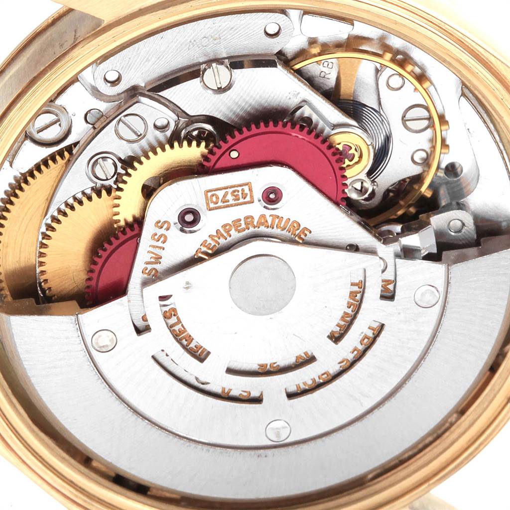 This close-up image shows the intricate inner movement mechanism of a Rolex Vintage Collection 1503 Men's Yellow Gold Silver Dial 1503 Men's Yellow Gold Silver Dial watch.