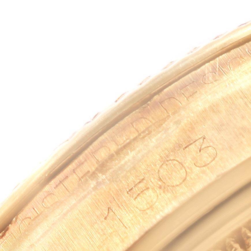 This image shows a close-up of the engraved number on the outer edge of a Vintage Collection Rolex watch case.