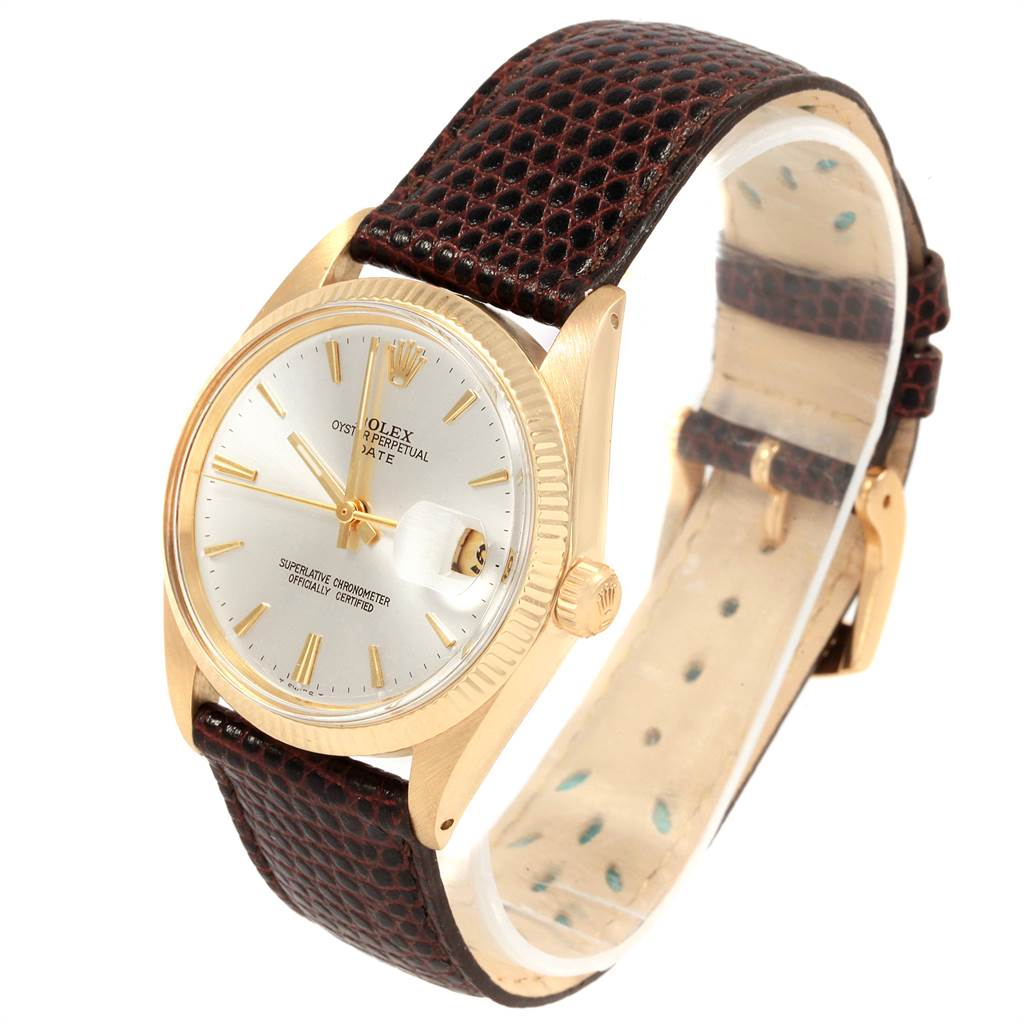 The Vintage Collection Rolex watch is shown at a three-quarter angle, highlighting the dial, crown, and leather strap.