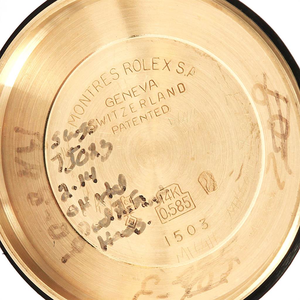 This image shows the engraved inner case back of a Rolex Vintage Collection 1503 Men's Yellow Gold Silver Dial 1503 Men's Yellow Gold Silver Dial model watch.