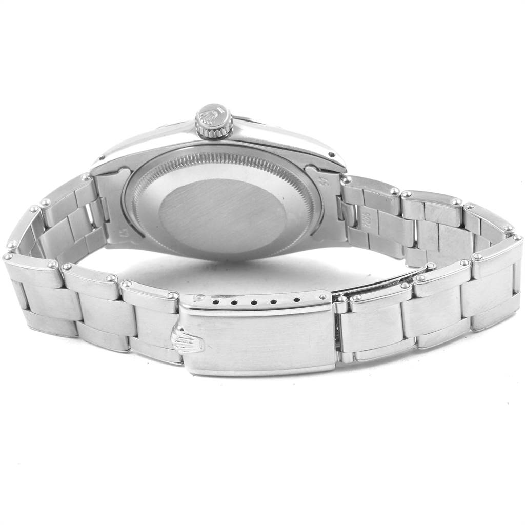 This image shows the back and the clasp of a Rolex Vintage Collection 1500 Men's Stainless Steel Silver Dial 1500 Men's Stainless Steel Silver Dial model watch at a slight angle.