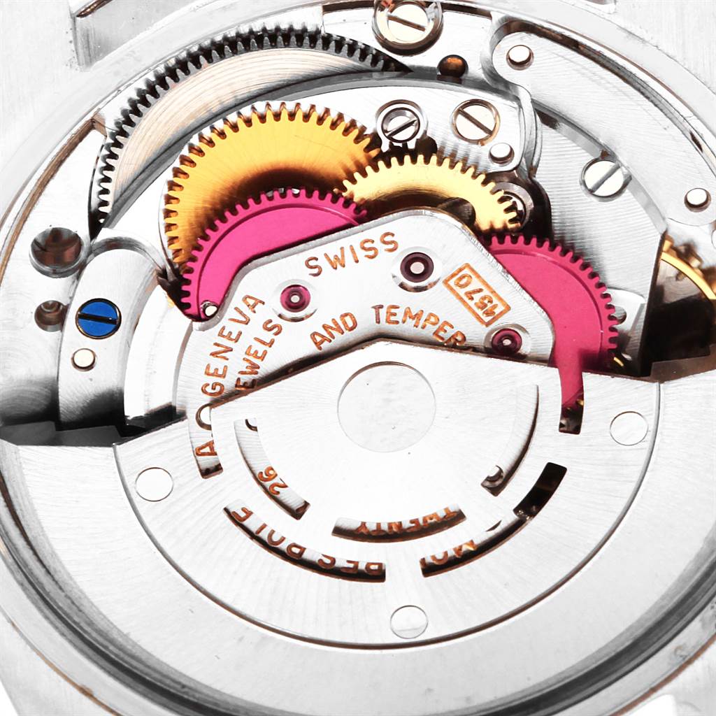This image shows a close-up of the internal mechanism and gears of a Rolex Vintage Collection 1500 Men's Stainless Steel Silver Dial 1500 Men's Stainless Steel Silver Dial watch.