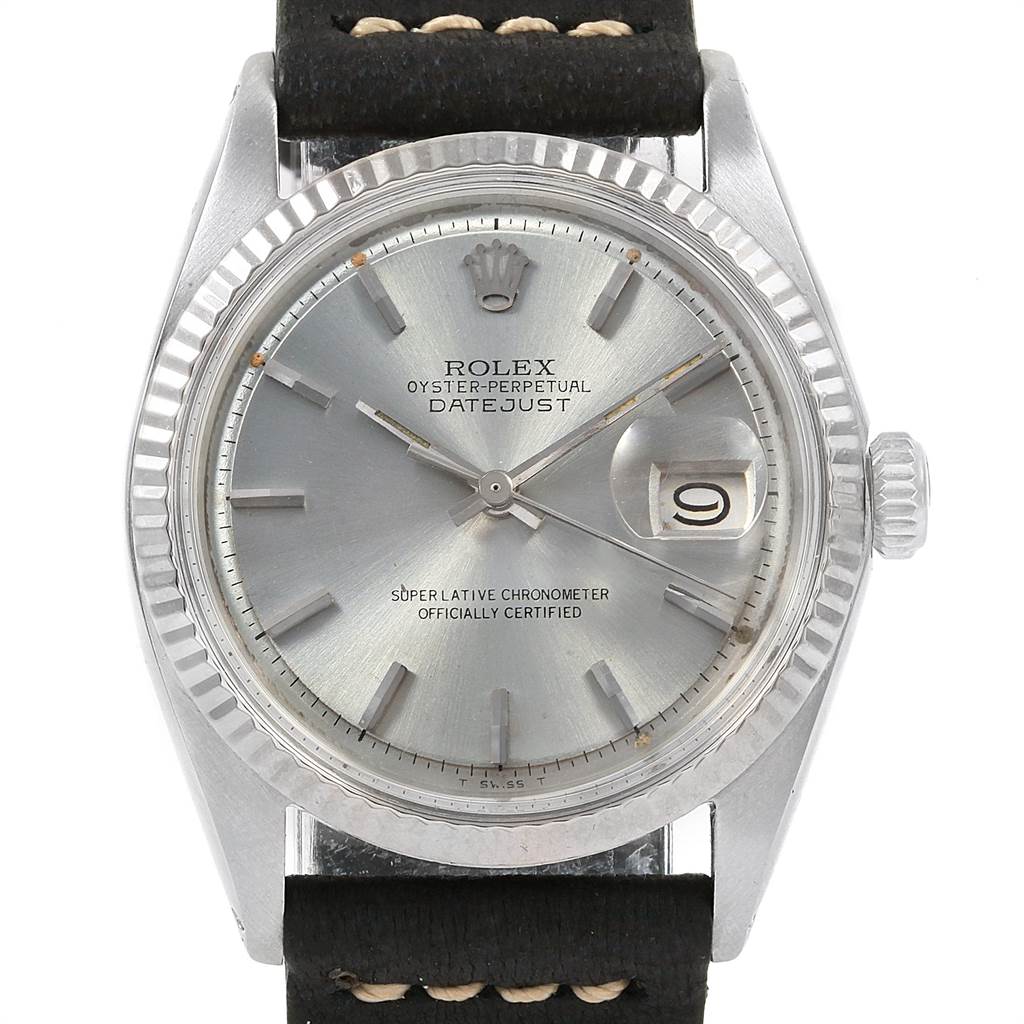 The image shows a front view of the Rolex Vintage Collection 1601 Men's Stainless Steel Silver Dial 1601 Men's Stainless Steel Silver Dial Oyster Perpetual Datejust watch, highlighting the dial, bezel, and part of the strap.