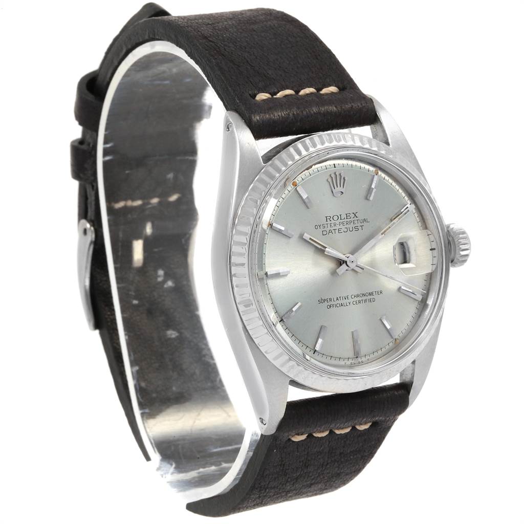 The Vintage Collection Rolex watch is shown at an angled side view, displaying the face, bezel, crown, and leather strap.