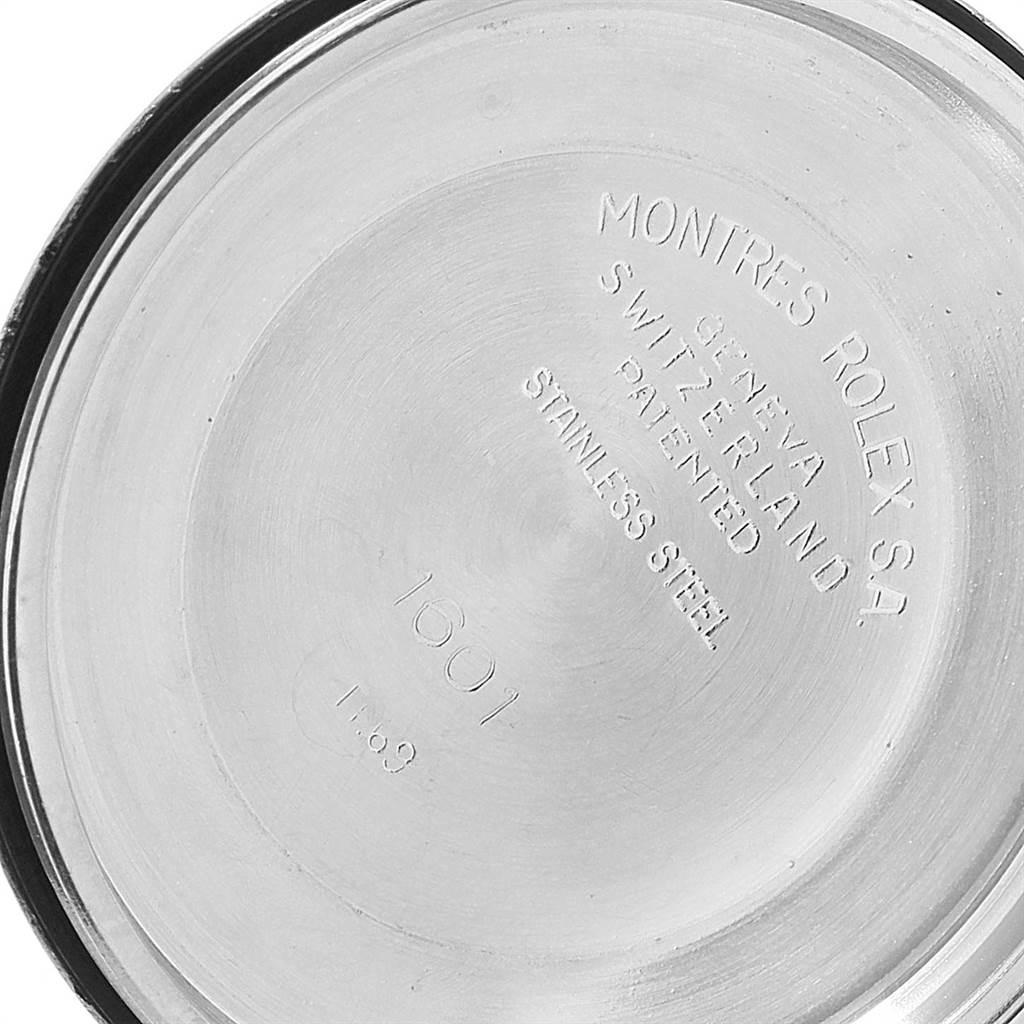 This image shows the interior engraving of the case back for a Rolex Vintage Collection 1601 Men's Stainless Steel Silver Dial 1601 Men's Stainless Steel Silver Dial model 1601.