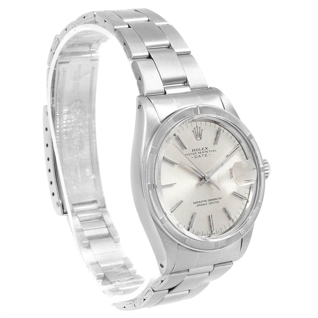 This image shows a side view of the Rolex Vintage Collection 1501 Men's Stainless Steel Silver Dial 1501 Men's Stainless Steel Silver Dial watch, highlighting its face, bracelet, and clasp.