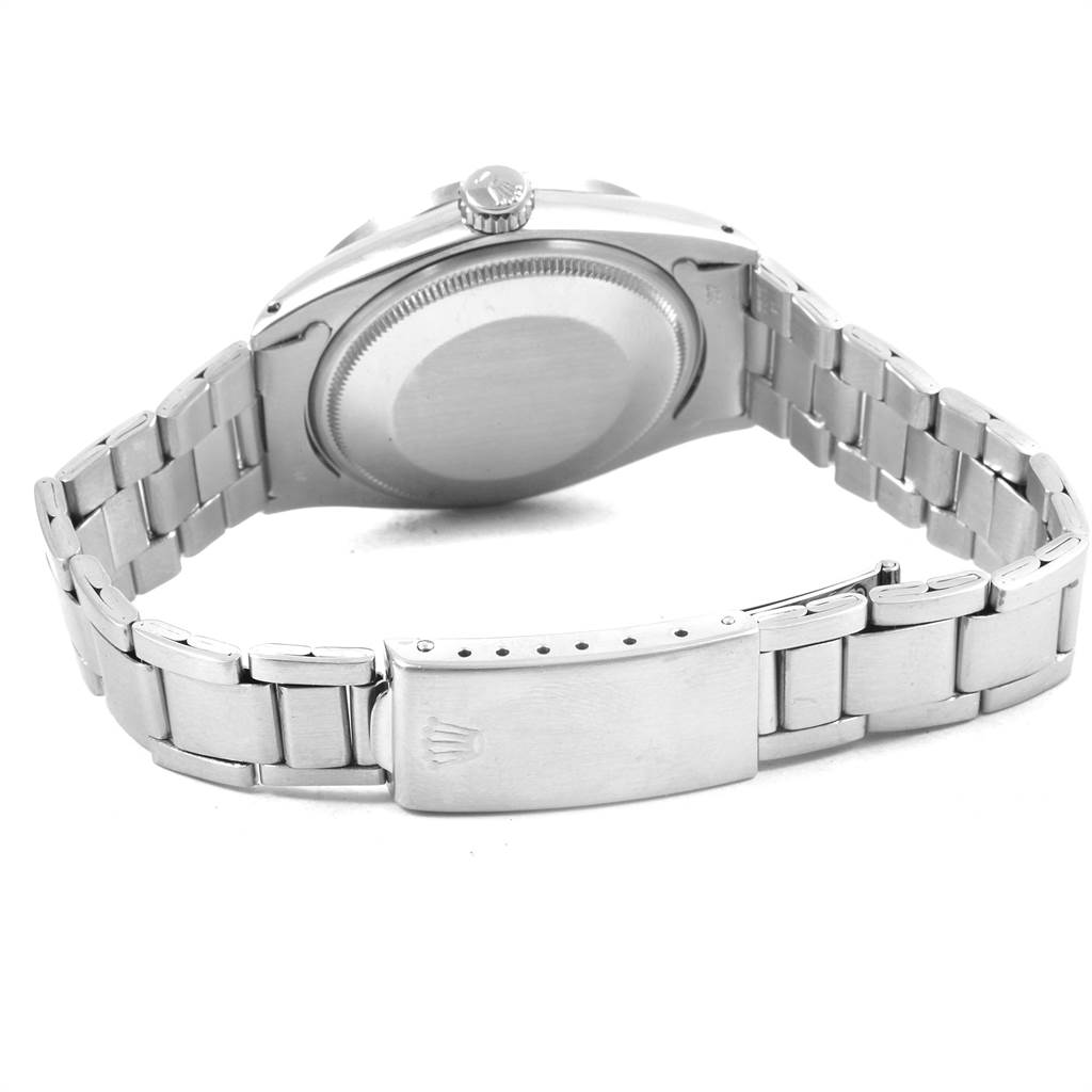 The image shows the back and bracelet of a Vintage Collection Rolex watch.