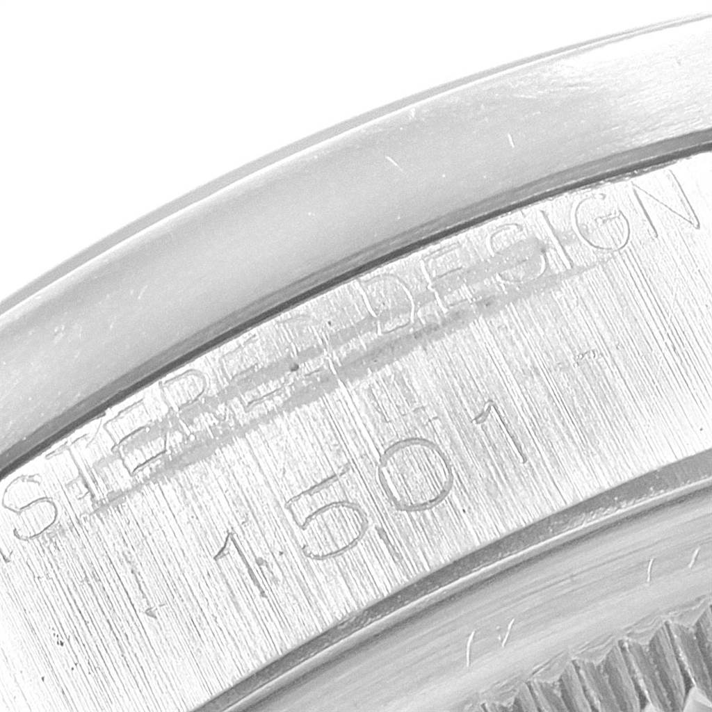 The close-up image shows a partial engraving on the rim of a Rolex Vintage Collection 1501 Men's Stainless Steel Silver Dial 1501 Men's Stainless Steel Silver Dial watch model.