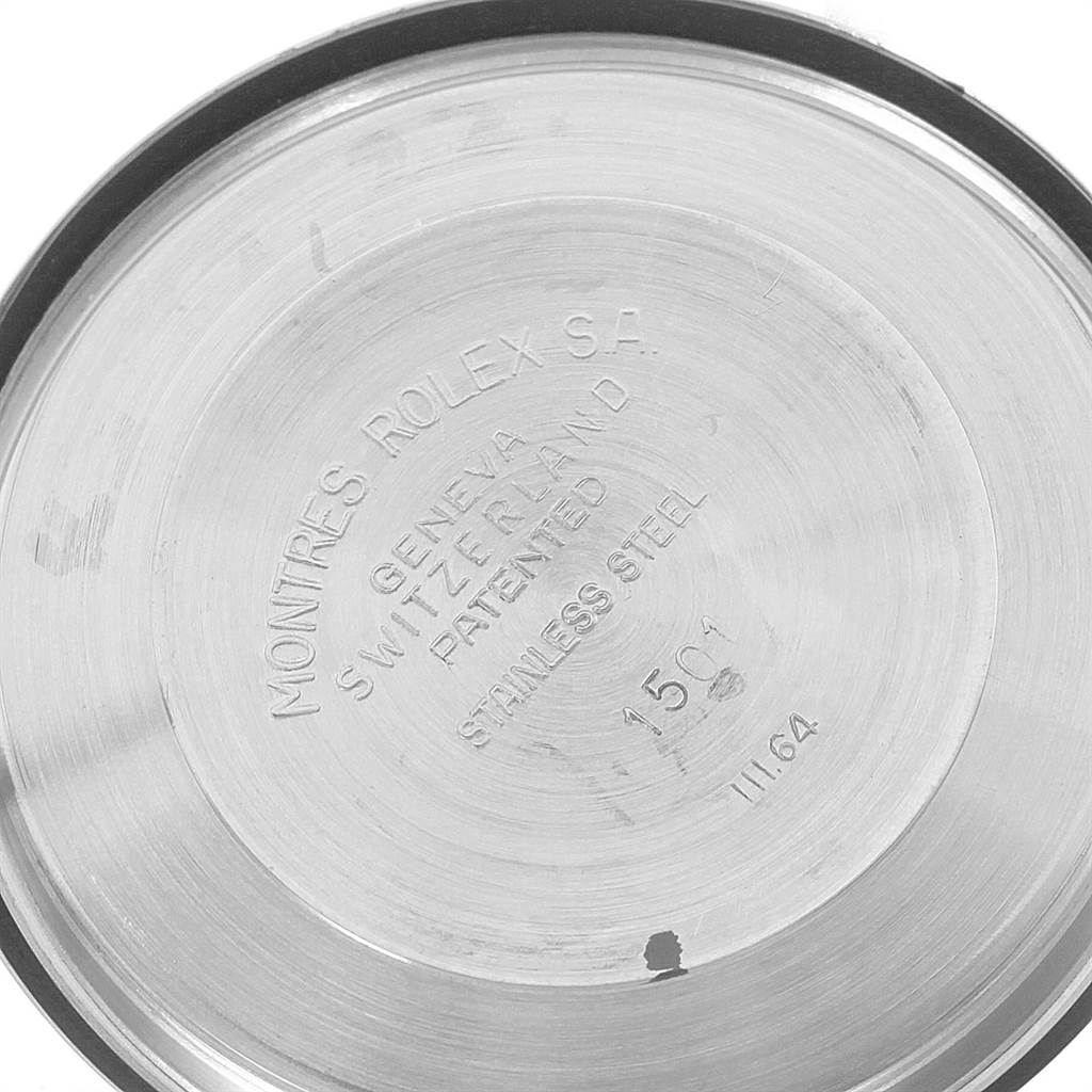 The image shows the polished stainless steel case back of a Rolex Vintage Collection 1501 Men's Stainless Steel Silver Dial 1501 Men's Stainless Steel Silver Dial model, bearing engraved details and markings.