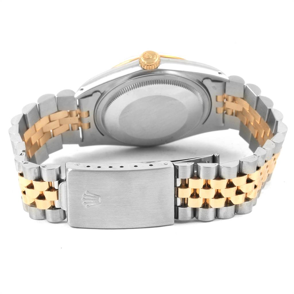 The image shows the back and bracelet of a Vintage Collection Rolex watch, featuring a two-tone metal band and closed clasp.
