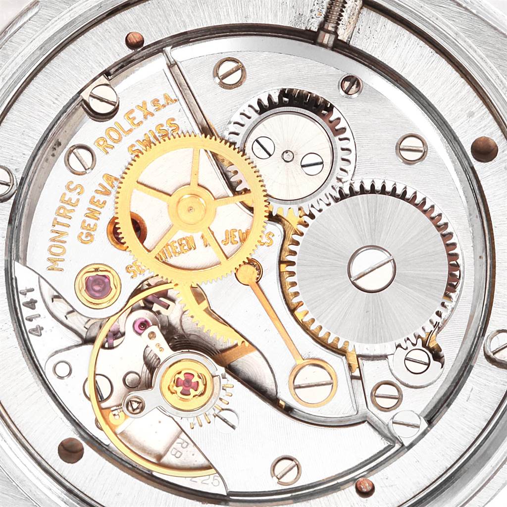 This image shows a close-up of the inner mechanical movements of a Vintage Collection watch by Rolex.