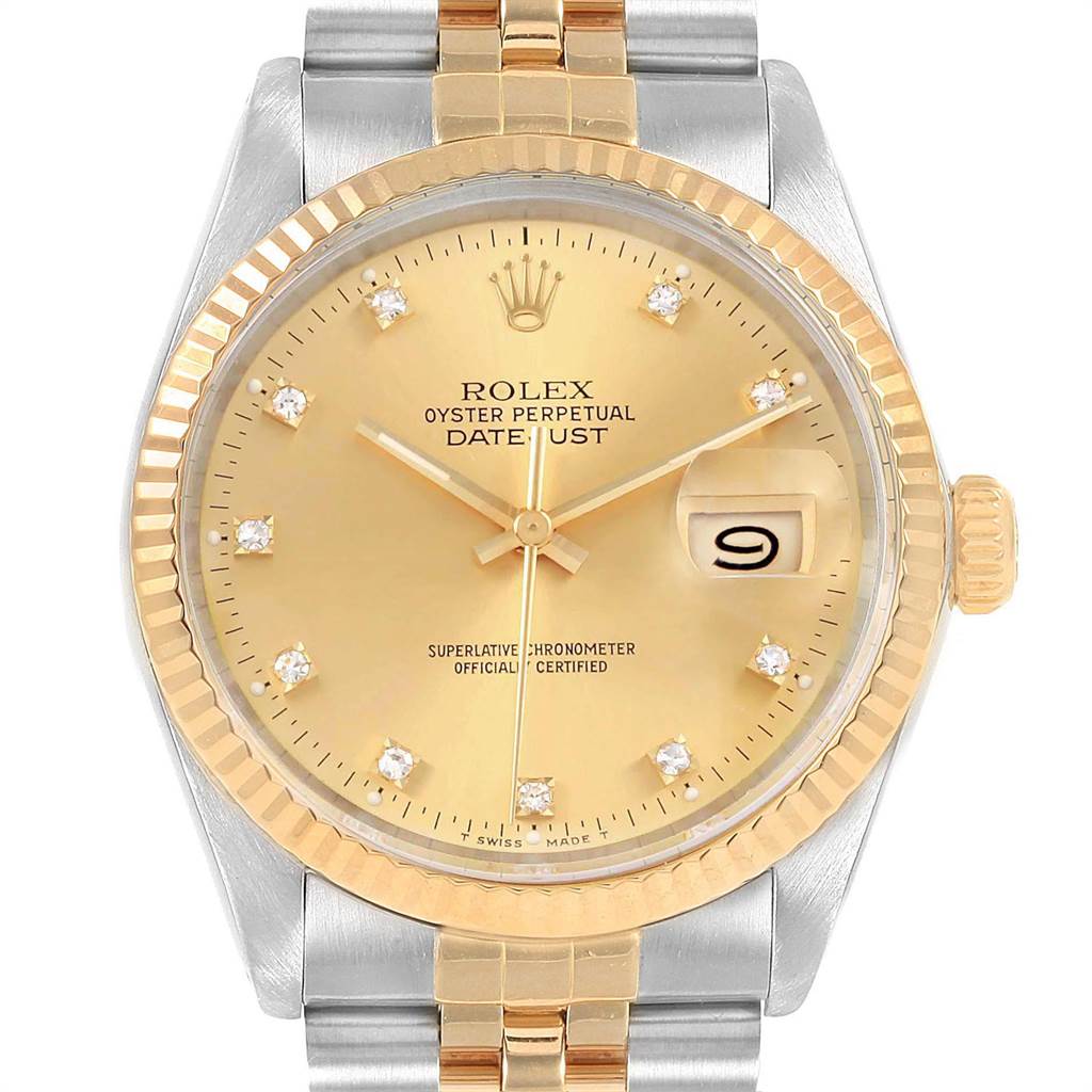 The image shows the face and top part of the strap of a Rolex Vintage Collection 16013 Men's Stainless Steel Champagne Dial 16013 Men's Stainless Steel Champagne Dial Oyster Perpetual Datejust watch.