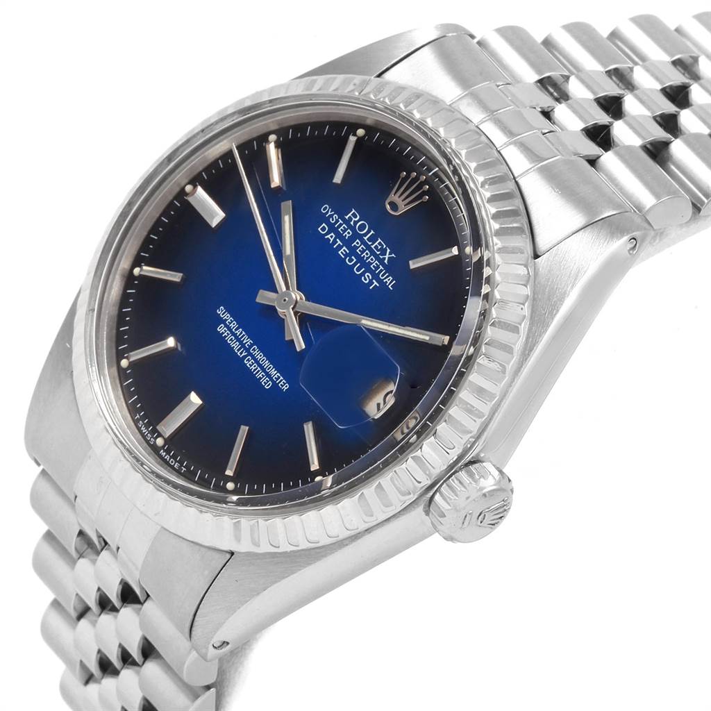 The image shows a Rolex Vintage Collection 1601 Men's Stainless Steel Blue Dial 1601 Men's Stainless Steel Blue Dial model watch at an angle highlighting the dial, bezel, and bracelet.