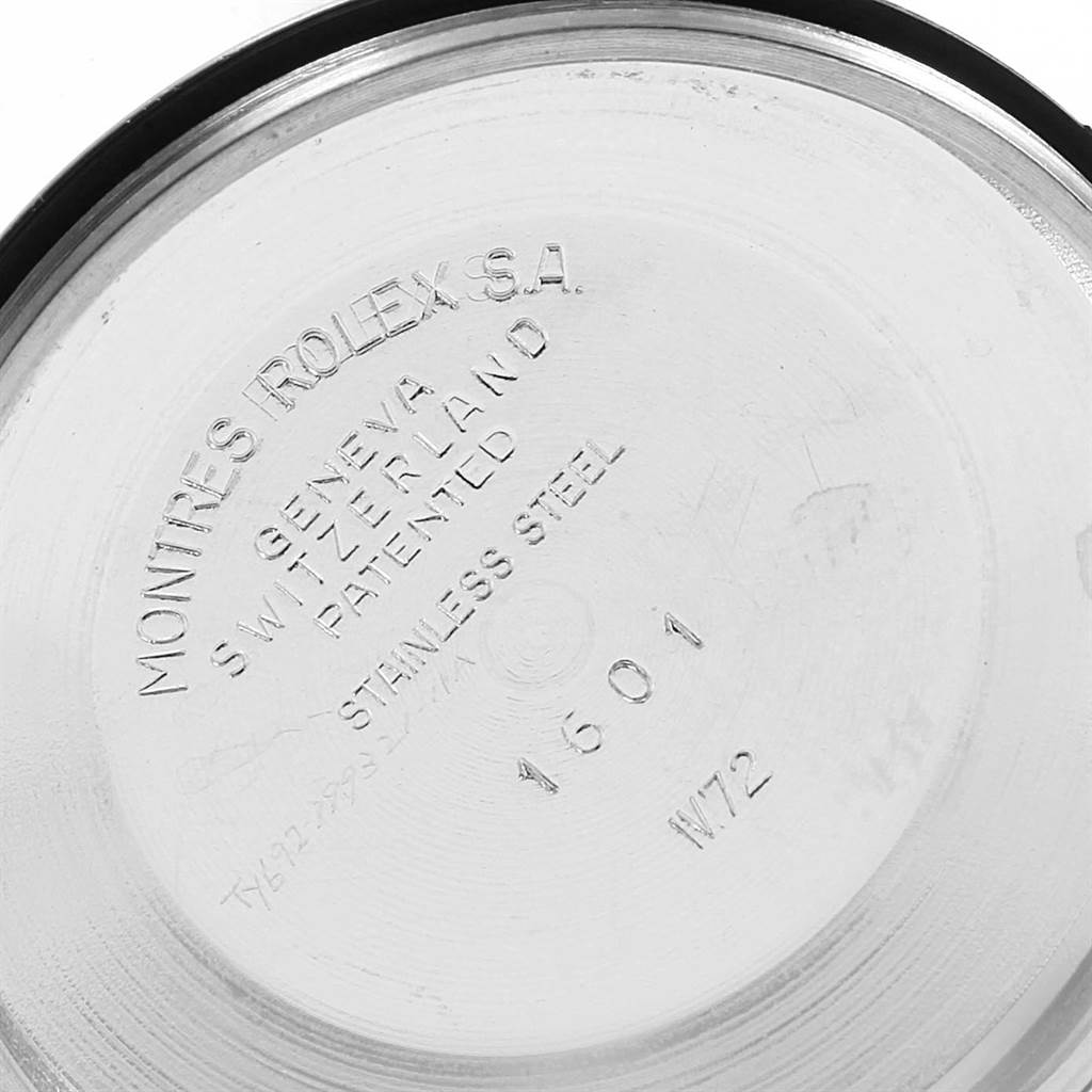 This image shows the inside case back of a Vintage Collection model by Rolex, displaying serial and patent information.